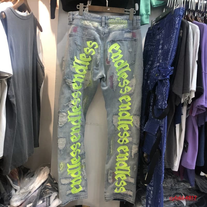 2020 ins trendy high street European and American English embroidery ripped retro jeans trousers men's knife-cut pants